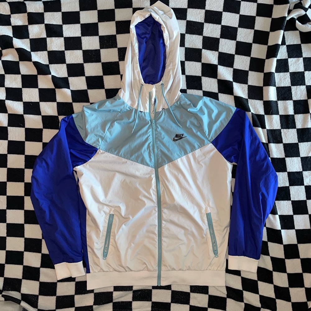 Blue and white Nike hooded windbreaker jacket, size medium